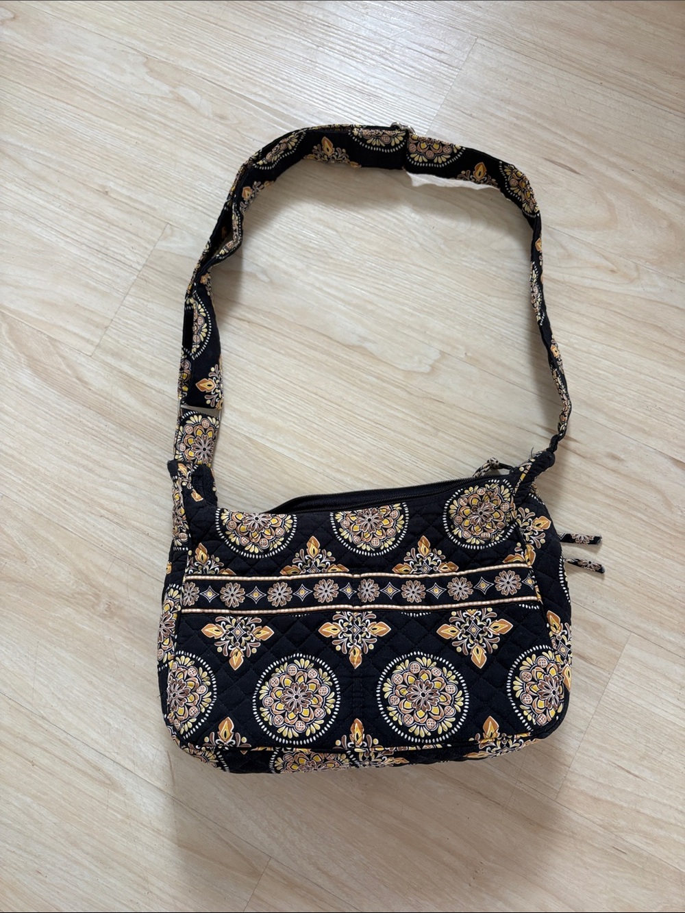 Black Quilted Crossbody Bag with Yellow Floral Medallions by